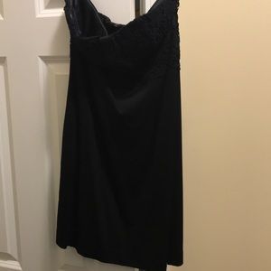 Black mini dress with floral lace pattern
